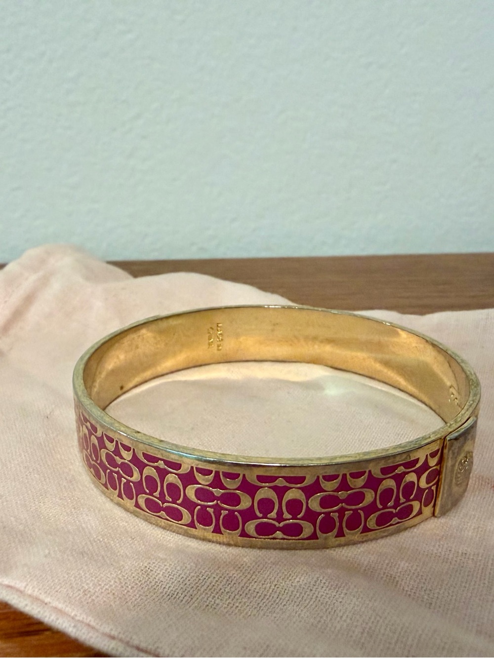 Coach Gold Tone Fuchsia Pink Enamel Signature C Hinged Bangle Bracelet